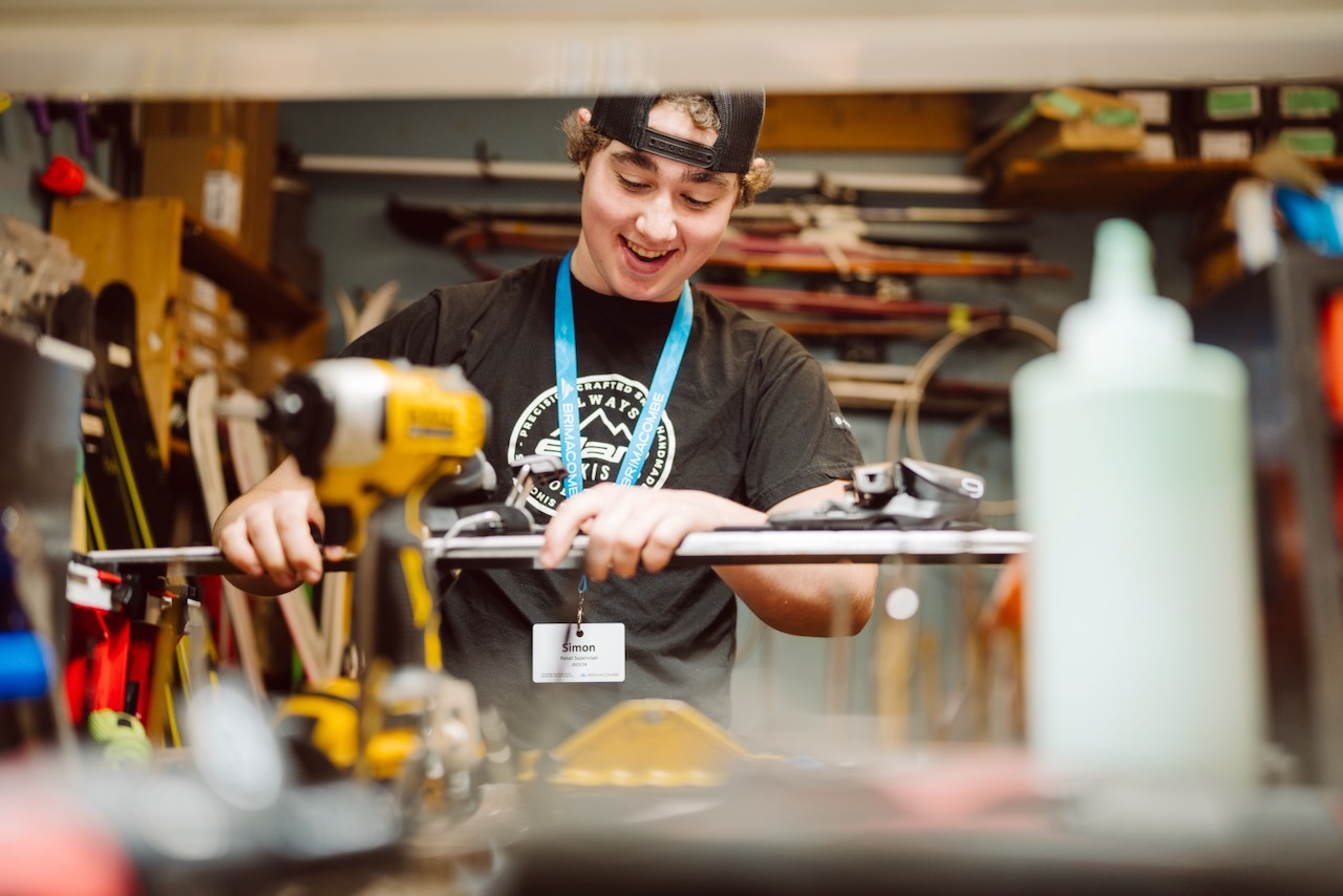 Service Technician working on skis at Brimacombe